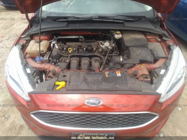 Photo 9 VIN: 1FADP3F25JL256096 - FORD FOCUS 