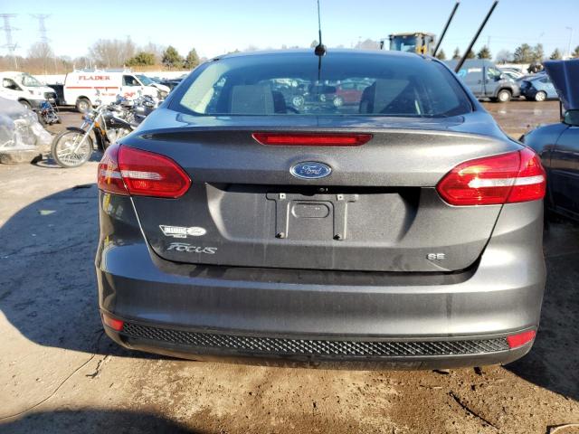 Photo 5 VIN: 1FADP3F25JL257572 - FORD FOCUS SE 