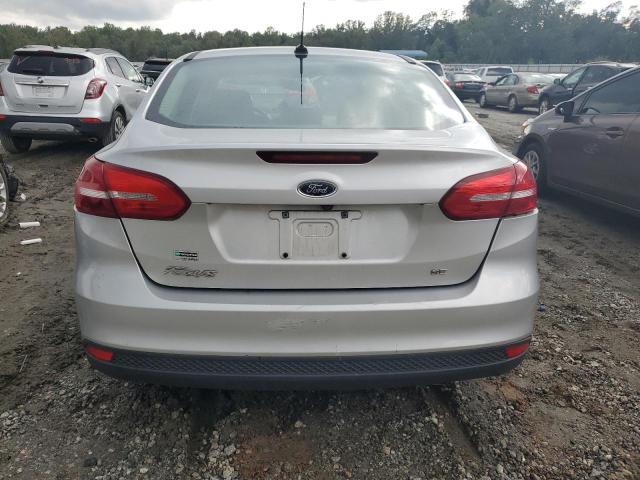 Photo 5 VIN: 1FADP3F25JL288661 - FORD FOCUS SE 