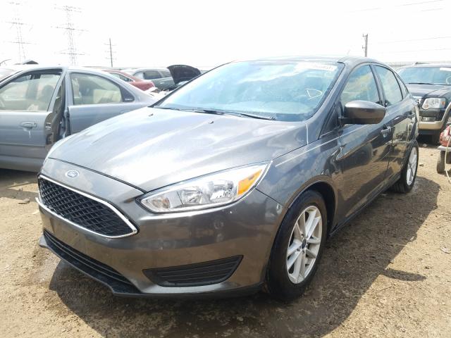 Photo 1 VIN: 1FADP3F25JL291902 - FORD FOCUS SE 