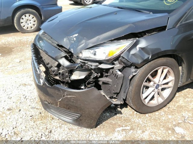 Photo 5 VIN: 1FADP3F25JL300744 - FORD FOCUS 