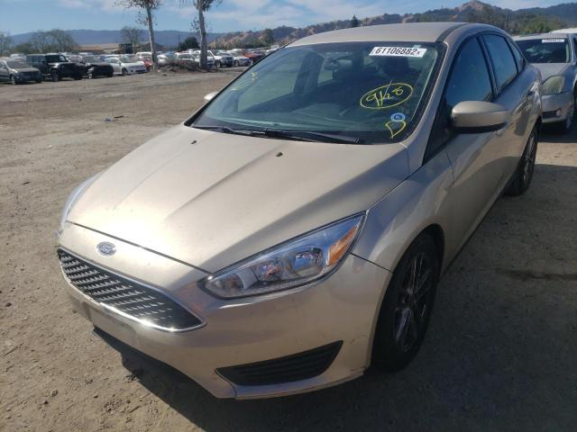 Photo 1 VIN: 1FADP3F25JL304390 - FORD FOCUS SE 