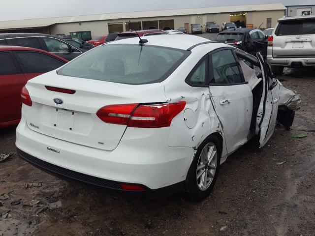 Photo 3 VIN: 1FADP3F25JL318919 - FORD FOCUS SE 