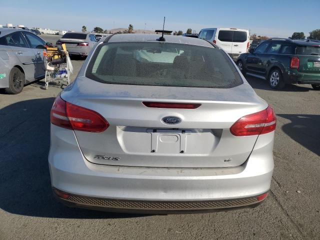 Photo 5 VIN: 1FADP3F25JL327197 - FORD FOCUS SE 