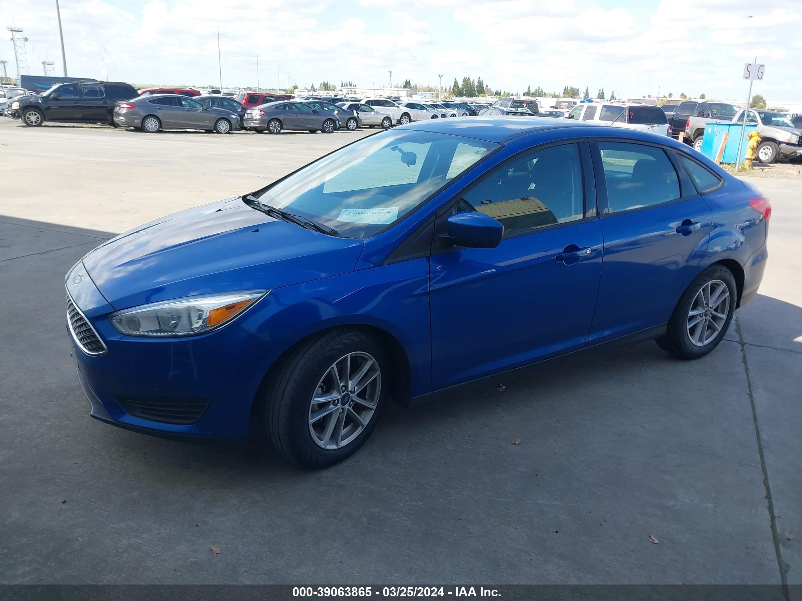 Photo 1 VIN: 1FADP3F25JL328608 - FORD FOCUS 