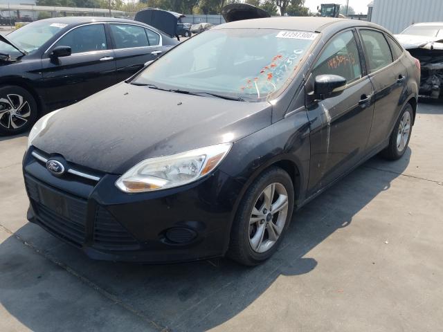 Photo 1 VIN: 1FADP3F26DL117079 - FORD FOCUS SE 