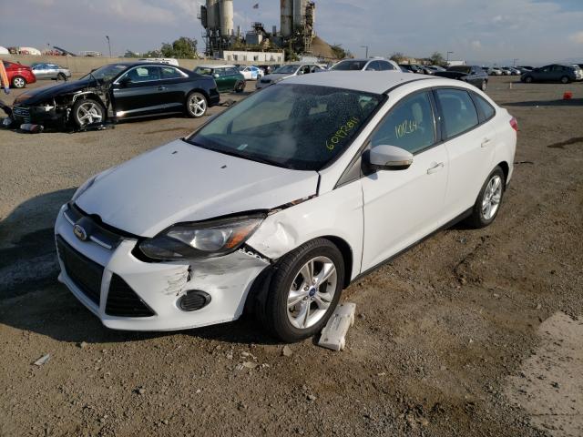 Photo 1 VIN: 1FADP3F26DL157131 - FORD FOCUS SE 