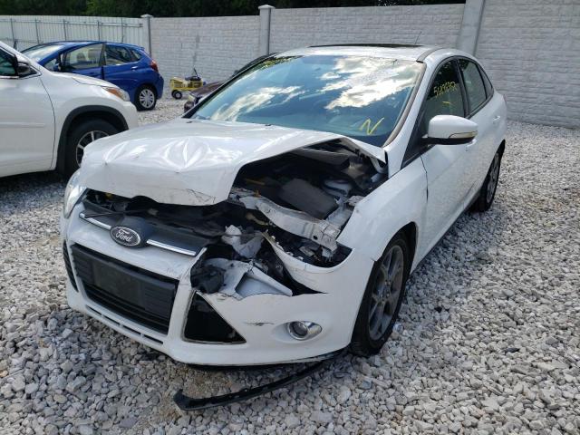 Photo 1 VIN: 1FADP3F26DL164810 - FORD FOCUS SE 