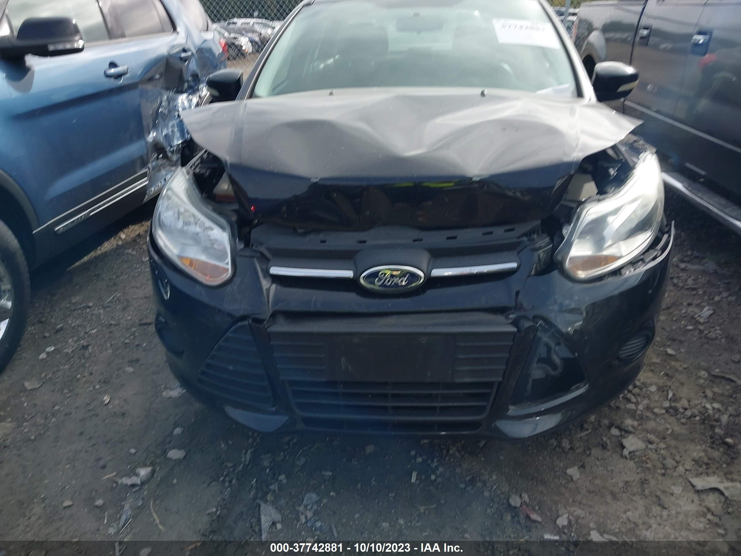 Photo 11 VIN: 1FADP3F26DL218994 - FORD FOCUS 