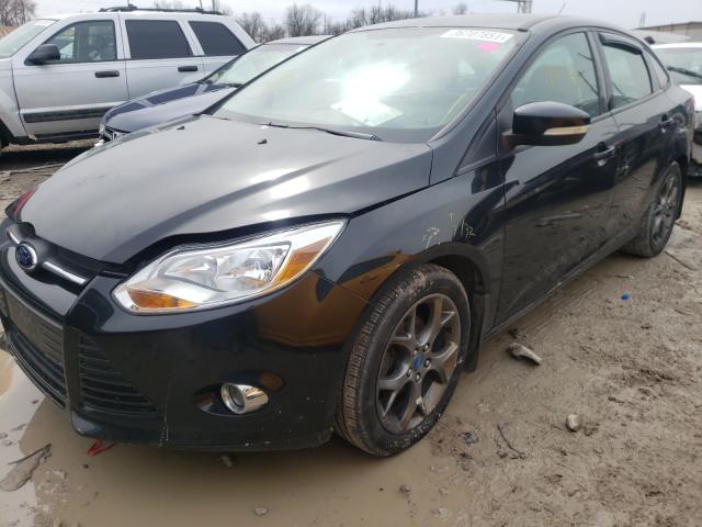 Photo 1 VIN: 1FADP3F26DL233382 - FORD FOCUS SE 