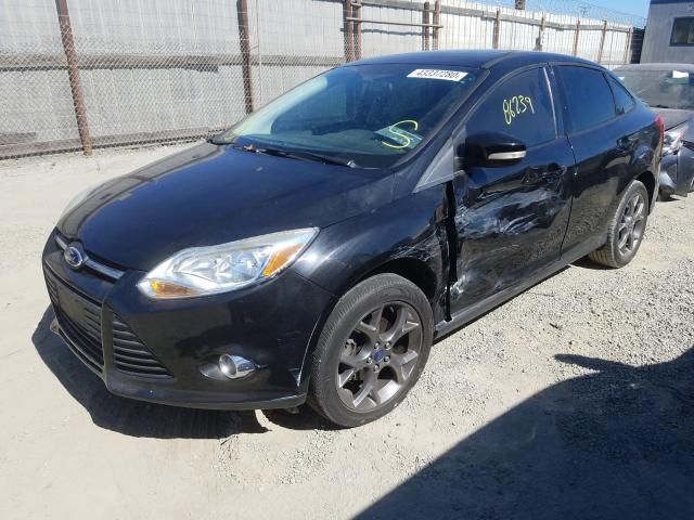 Photo 1 VIN: 1FADP3F26DL235200 - FORD FOCUS SE 