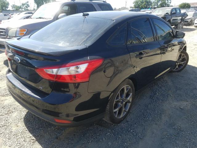 Photo 3 VIN: 1FADP3F26DL235200 - FORD FOCUS SE 