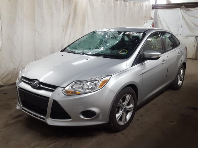 Photo 1 VIN: 1FADP3F26DL284879 - FORD FOCUS SE 