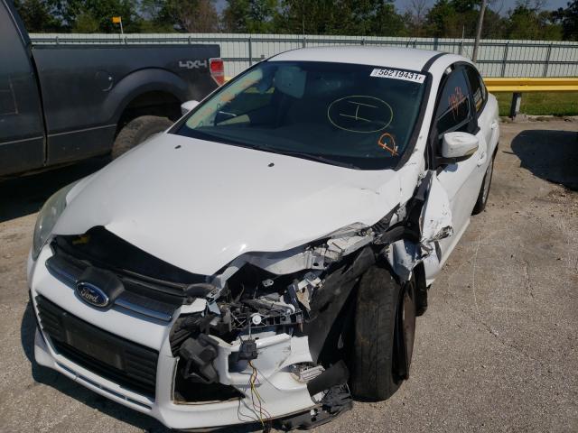 Photo 1 VIN: 1FADP3F26DL286664 - FORD FOCUS SE 