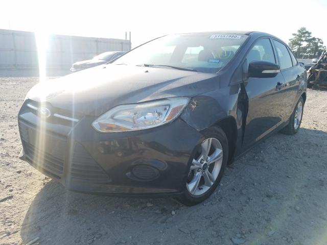 Photo 1 VIN: 1FADP3F26DL300983 - FORD FOCUS SE 