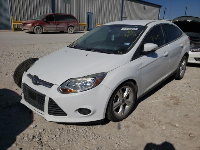 Photo 1 VIN: 1FADP3F26DL318772 - FORD FOCUS SE 