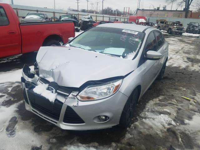 Photo 1 VIN: 1FADP3F26DL342652 - FORD FOCUS SE 