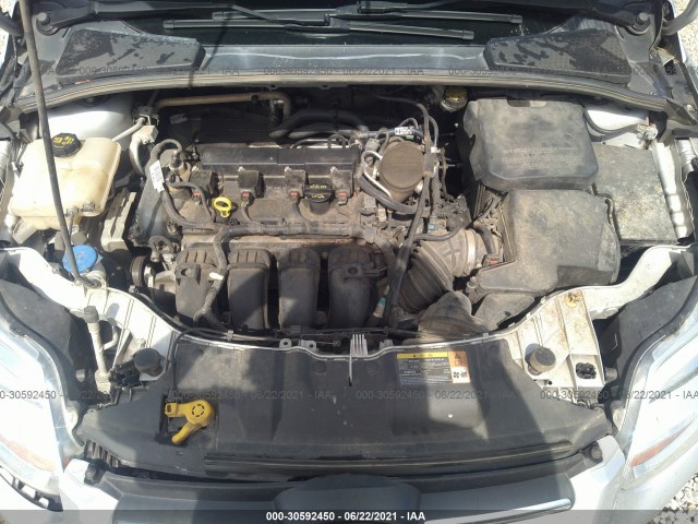 Photo 9 VIN: 1FADP3F26DL354638 - FORD FOCUS 