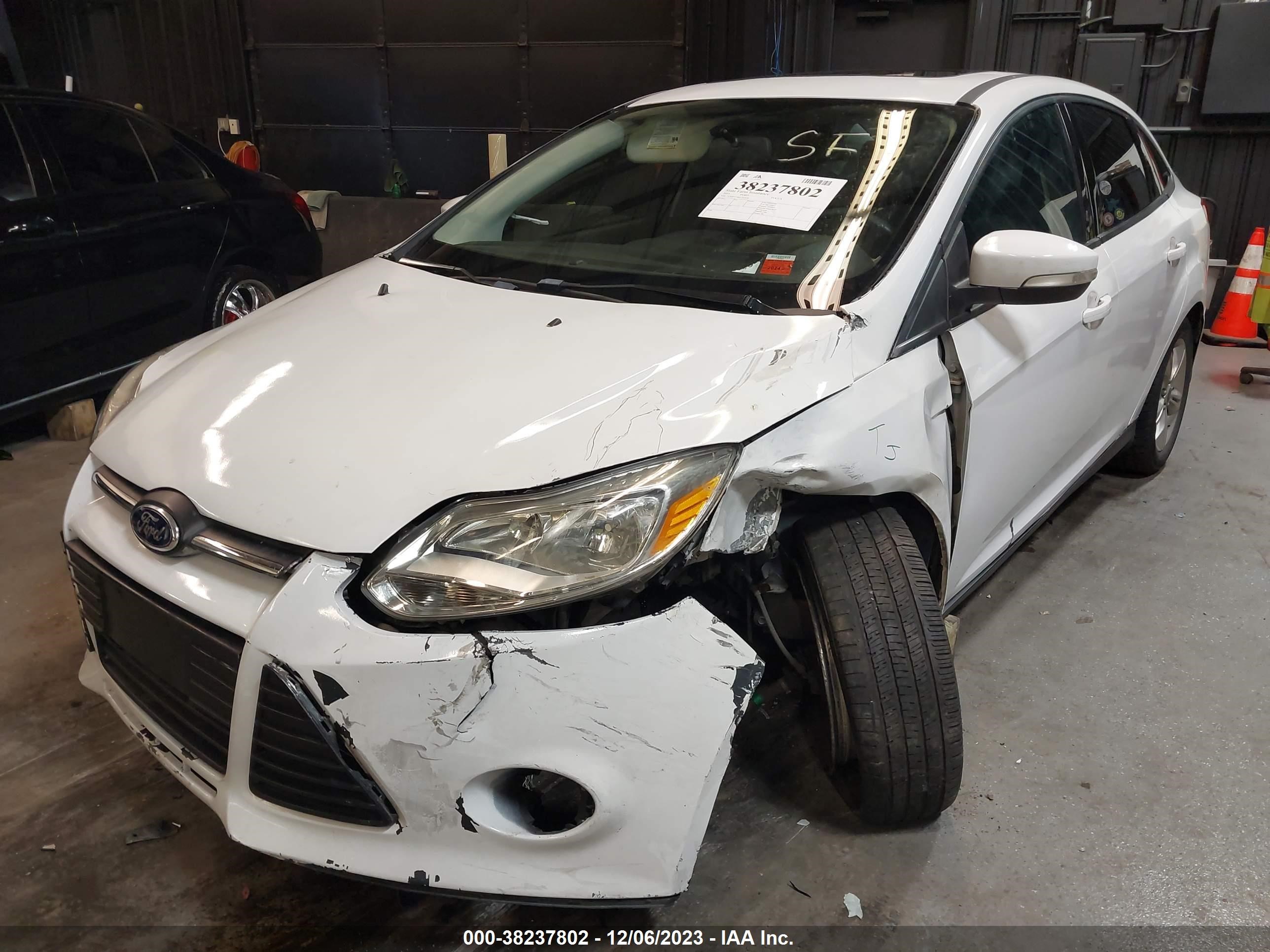 Photo 1 VIN: 1FADP3F26EL147328 - FORD FOCUS 