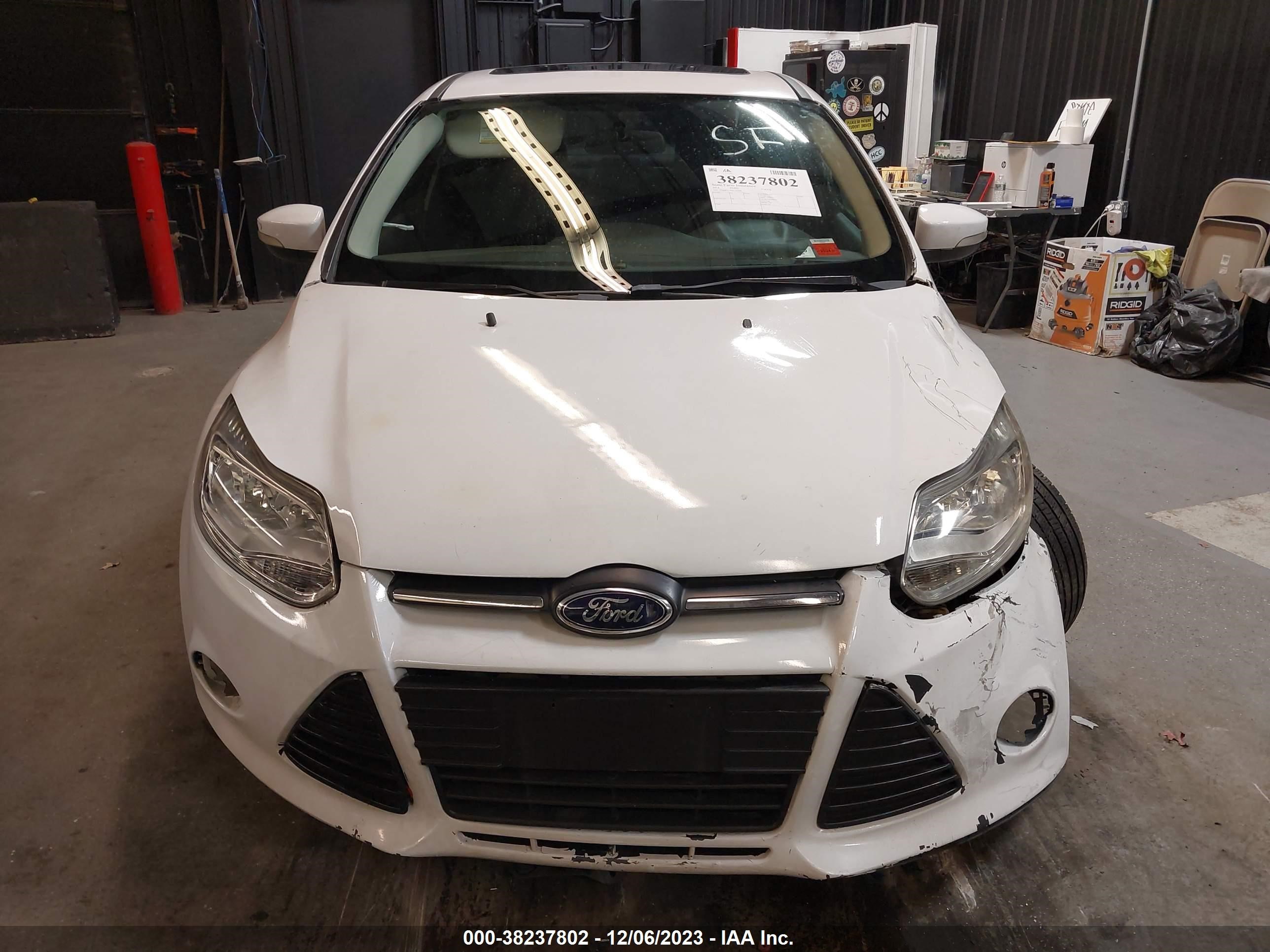 Photo 11 VIN: 1FADP3F26EL147328 - FORD FOCUS 