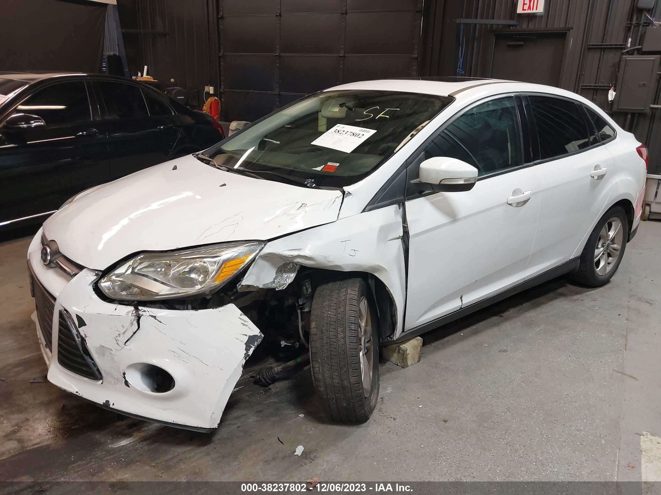 Photo 5 VIN: 1FADP3F26EL147328 - FORD FOCUS 