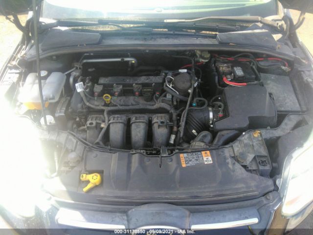 Photo 9 VIN: 1FADP3F26EL282101 - FORD FOCUS 