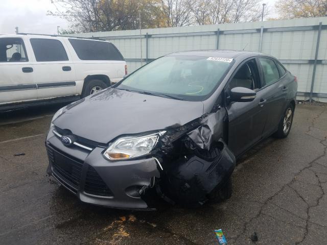 Photo 1 VIN: 1FADP3F26EL301021 - FORD FOCUS SE 