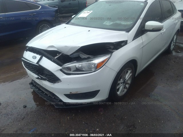 Photo 5 VIN: 1FADP3F26FL317348 - FORD FOCUS 