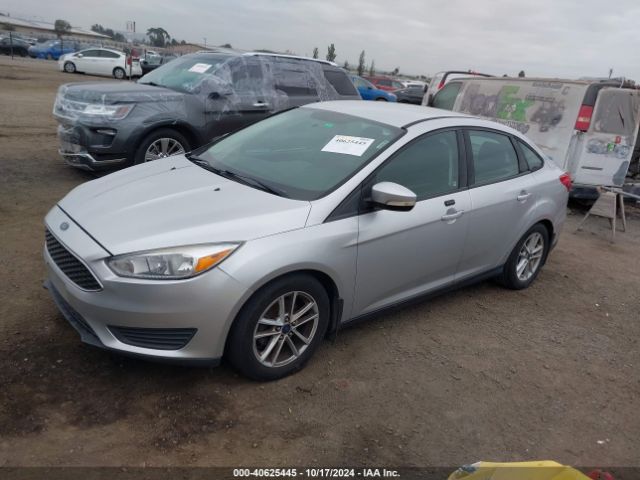 Photo 1 VIN: 1FADP3F26GL202346 - FORD FOCUS 