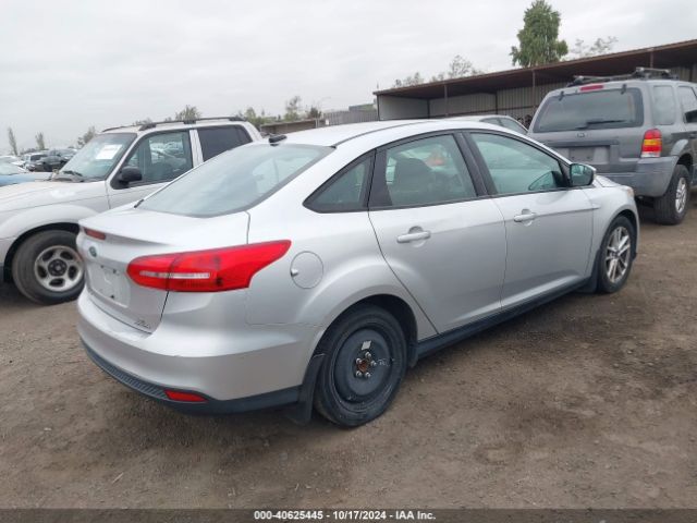 Photo 3 VIN: 1FADP3F26GL202346 - FORD FOCUS 