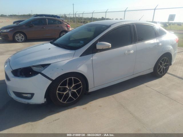 Photo 1 VIN: 1FADP3F26GL202752 - FORD FOCUS 