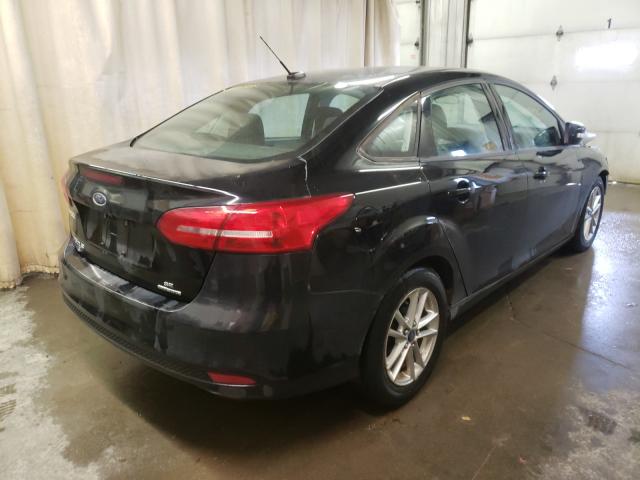 Photo 3 VIN: 1FADP3F26GL212682 - FORD FOCUS 