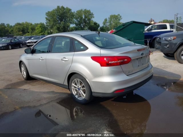 Photo 2 VIN: 1FADP3F26GL217011 - FORD FOCUS 