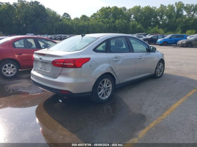 Photo 3 VIN: 1FADP3F26GL217011 - FORD FOCUS 