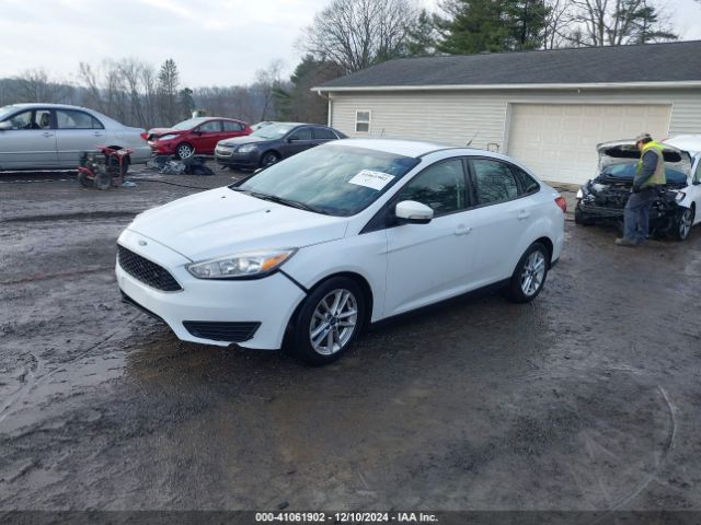 Photo 1 VIN: 1FADP3F26GL220264 - FORD FOCUS 