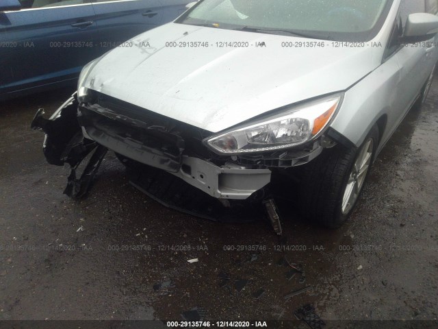 Photo 5 VIN: 1FADP3F26GL231572 - FORD FOCUS 