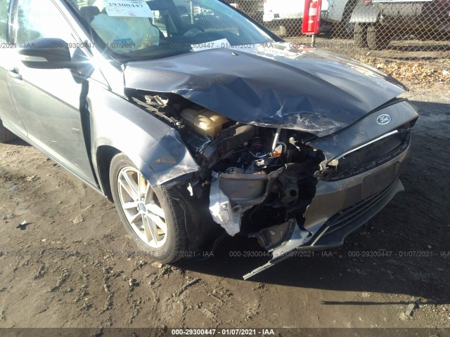 Photo 5 VIN: 1FADP3F26GL235976 - FORD FOCUS 