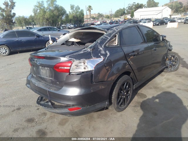 Photo 3 VIN: 1FADP3F26GL246749 - FORD FOCUS 