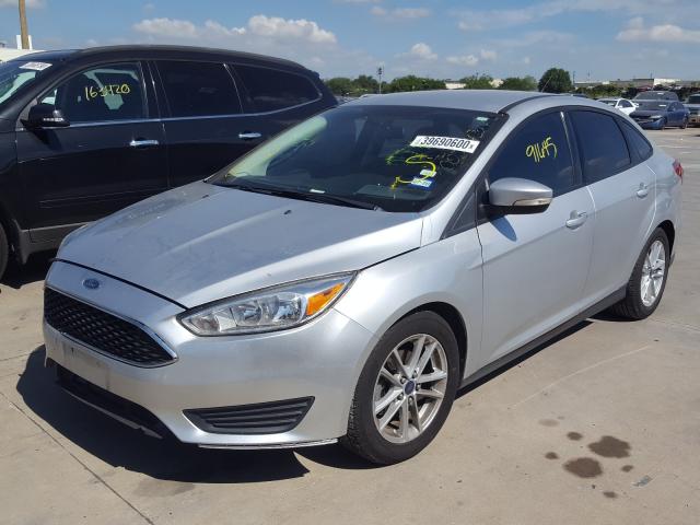 Photo 1 VIN: 1FADP3F26GL272705 - FORD FOCUS SE 