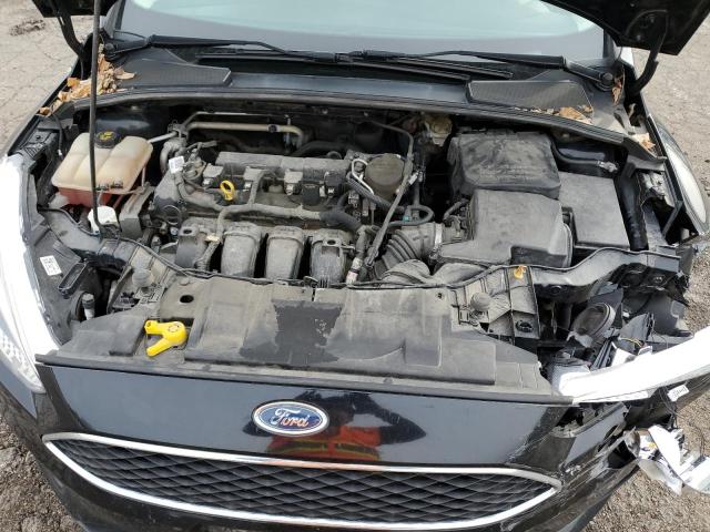 Photo 10 VIN: 1FADP3F26GL289018 - FORD FOCUS SE 