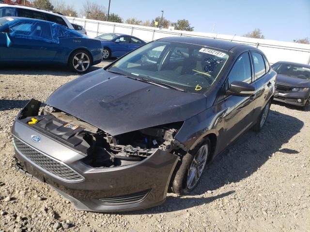 Photo 1 VIN: 1FADP3F26GL322034 - FORD FOCUS SE 