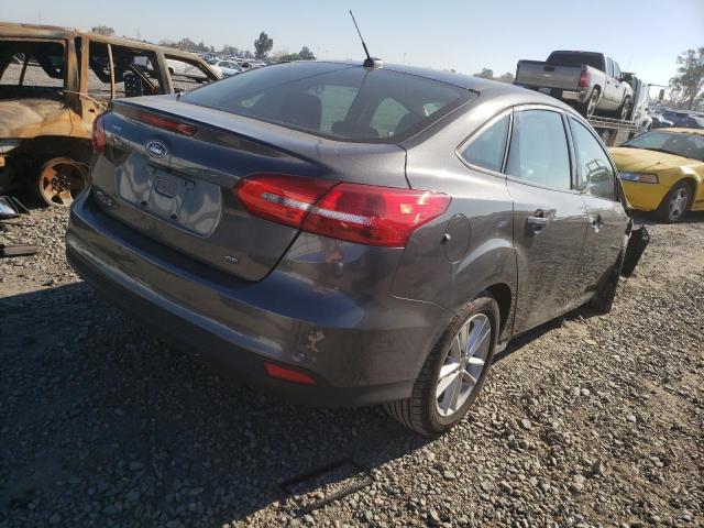 Photo 3 VIN: 1FADP3F26GL322034 - FORD FOCUS SE 