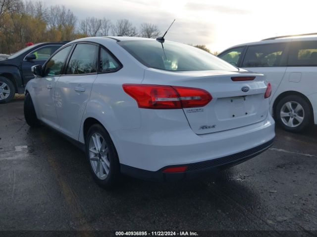 Photo 2 VIN: 1FADP3F26GL322132 - FORD FOCUS 