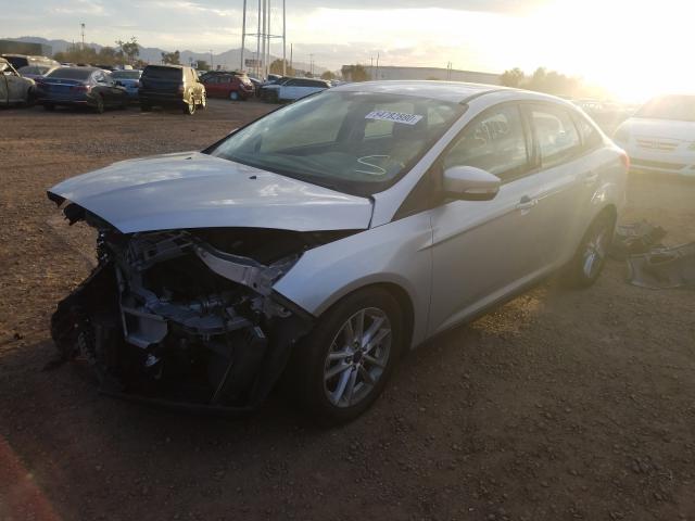 Photo 1 VIN: 1FADP3F26GL325144 - FORD FOCUS SE 