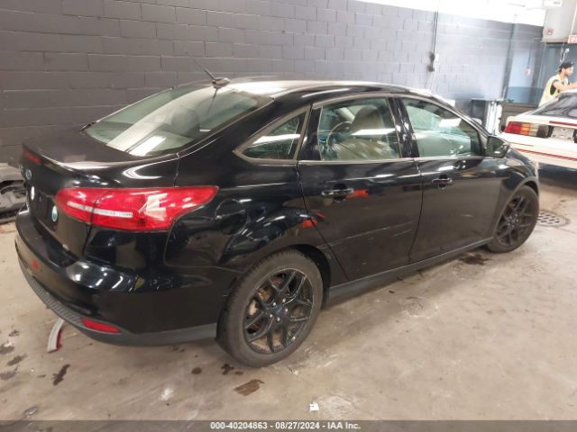 Photo 3 VIN: 1FADP3F26GL330263 - FORD FOCUS 