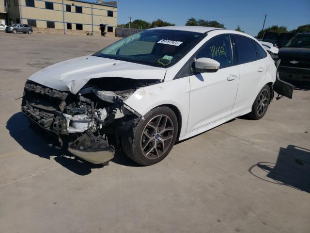 Photo 1 VIN: 1FADP3F26GL331395 - FORD FOCUS SE 