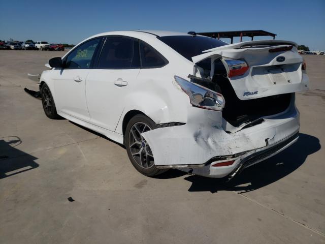 Photo 2 VIN: 1FADP3F26GL331395 - FORD FOCUS SE 