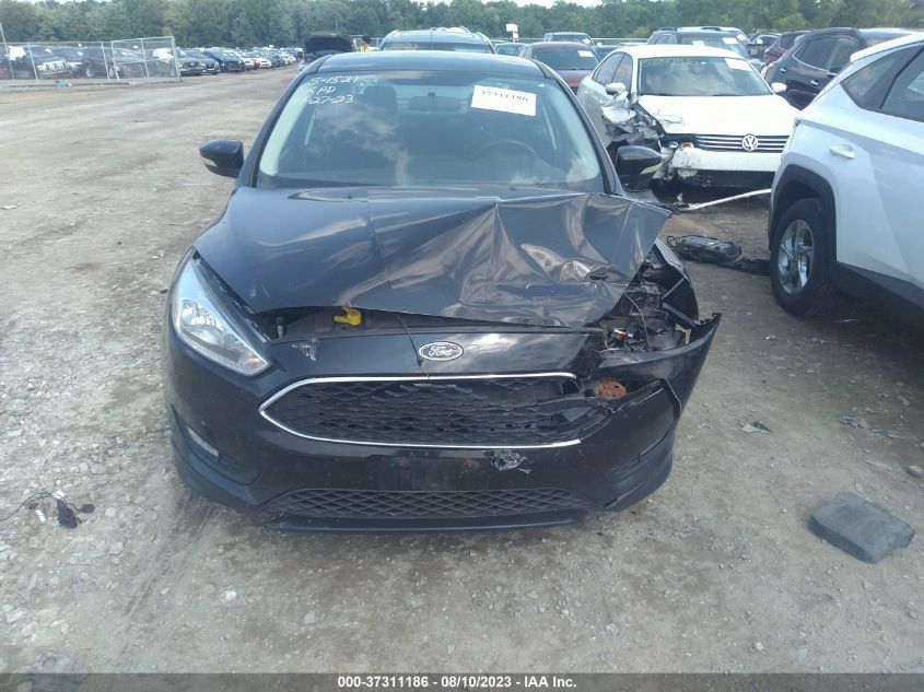 Photo 5 VIN: 1FADP3F26GL343367 - FORD FOCUS 