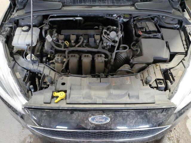 Photo 10 VIN: 1FADP3F26GL357320 - FORD FOCUS SE 