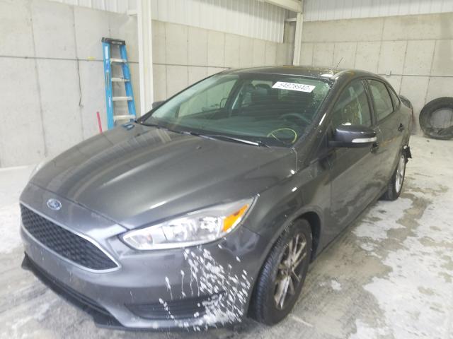 Photo 1 VIN: 1FADP3F26GL358631 - FORD FOCUS 